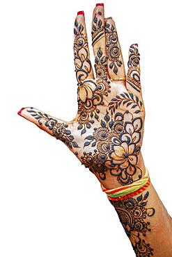 Hand of Hindu bride painted with hennas isolated on white background, Mauritius, Africa