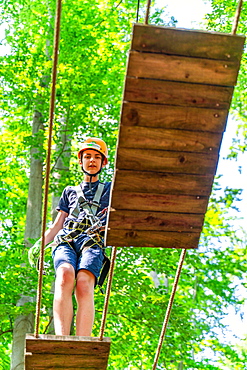 Boy climbing in the climbing forest and high ropes course, Potsdam Adventure Park, Potsdam, Brandenburg, Germany, Europe