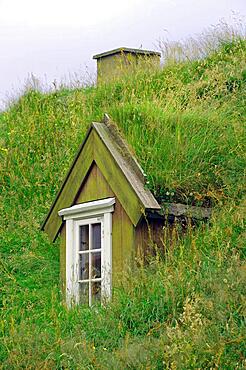 Wooden windows in a roof made of thick grass, Suduroy, Faroe Islands, Denmark, Europe