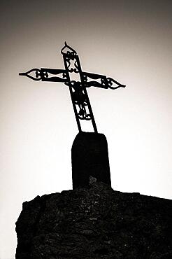 Twisted cross on a clear sky