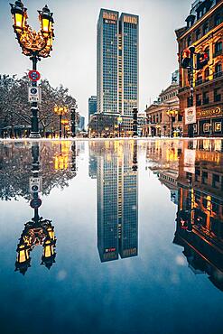 View over the Opernplatz to the Opernturm, in the morning, illuminated and in winter, Frankfurt, Hesse, Germany, Europe