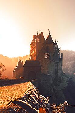 Eltz Castle, winter and sunrise, Ganerbenburg, Muenstermaifeld, Wierschem, Moselle, Rhineland-Palatinate, Germany, Europe