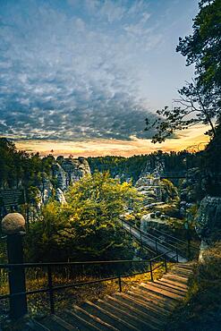 Sunrise on the Bastei Bridge in Saxon Switzerland, view from Felsenburg Neurathen, Saxony, Germany, Europe