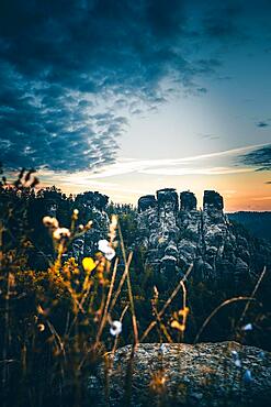 Schrammsteine with Falkenstein and Koenigstein at sunrise, Saxon Switzerland National Park, Elbe Sandstone Mountains, Saxony, Germany, Europe