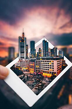 The Hauptwache, view from above onto a square with shops and restaurants, in the background the skyline Illuminated in the evening, everything comes from an instant photo, Frankfurt, Hesse, Germany, Europe