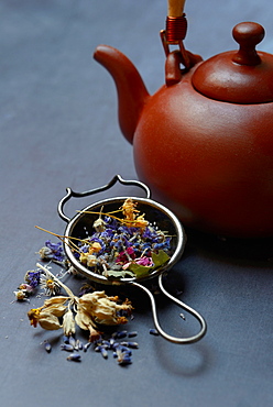 Tea blend in tea strainer, medicinal herb blend