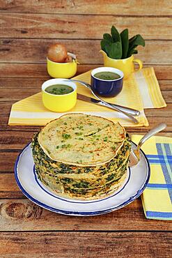 Swabian cuisine, spinach cake spoon style with pancakes, Flaedle layered, pancake cake on plate, cake server, cake shovel, Swabian speciality, Germany, Europe