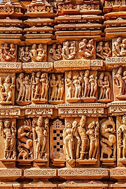 Stone carving bas relief sculptures on Vaman Temple, famous indian tourist site Khajuraho, Madhya Pradesh, India, Asia