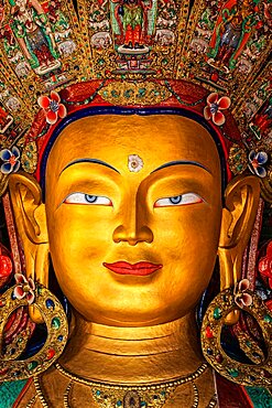 Maitreya Buddha statue face close up in Thiksey Gompa. Ladakh, India, Asia