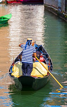 Venetian gondola on a canal, Venice, Veneto, Italy, Europe