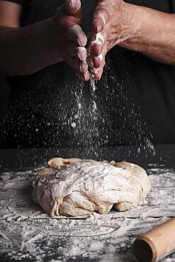 Cooking dough by elderly woman cook hands for homemade pastry bread, pizza, pasta recipe preparation on table background