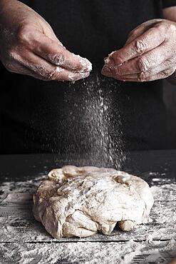 Cooking dough by elderly woman cook hands for homemade pastry bread, pizza, pasta recipe preparation on table background