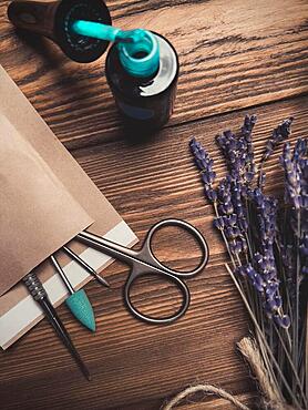 A set of sterile manicure tools in a craft package. Nail salon. Close-up