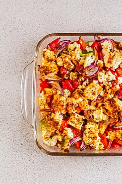 Baked vegetables with feta cheese in the pan