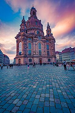 Long exposure of the Church of Our Lady in Dresden at sunset and pink clouds, Dresden, Saxony, Germany, Europe