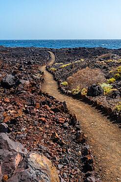 Volcanic trail in the town of Tamaduste located on the coast of the island of El Hierro, Canary Islands, Spain, Europe