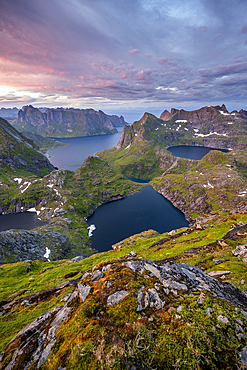 View over mountain tops and sea, with lakes Litlforsvatnet and Tennesvatnet and fjord Forsfjorden, dramatic sunset, from Hermannsdalstinden, Moskenesoey, Lofoten, Nordland, Norway, Europe