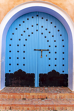 Arabic oriental styled door in Chefchaouen, Morocco, Africa