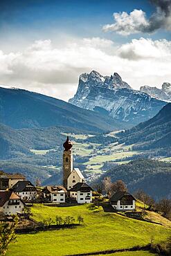 Snow-covered mountains and church, St. Nicholas Church, spring, Mittelberg am Ritten, near Bolzano, Dolomites, South Tyrol, Italy, Europe