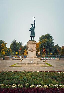 Stephen III The Great monument (Stefan cel Mare statue) in front of the park in a rainy autumn day, Chisinau city, Moldova, Europe