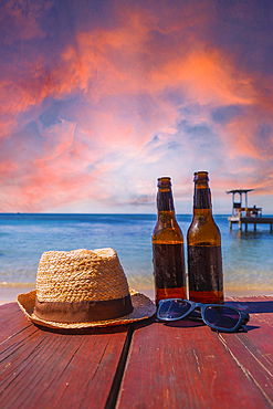 Two beers on West End beach on Roatan Island. Honduras