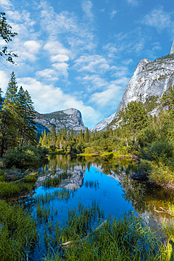 Reflections in the water of the Yosemite Mountains in Mirror lake, Yosemite. California, United States, North America