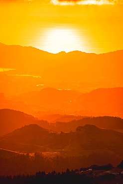 Gradient of colors in a beautiful sunset from a top of a mountain