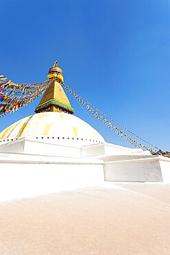 White base and second level platform supporting eyes of the spire at Boudhanath Stupa in Kathmandu, Nepal. Vertical