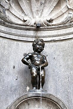 The Mannekin Pis in Brussels, is a famous statue of a boy urinating, Belgium, Europe