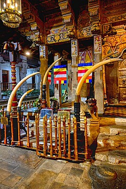 Temple of the sacred Tooth Relic or Sri Dalada Maligawa, Holy Shrine decorated with elephant tusks, Kandy, Sri Lanka