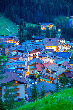 View over town at dusk, Canazei, Val di Fassa, Trentino-Alto Adige, Italy, Europe