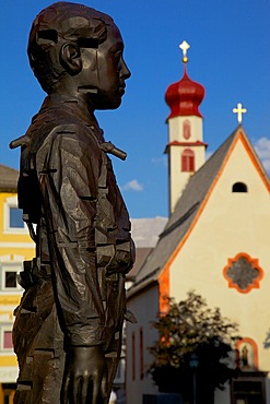 Street sculpture and Little Church, Ortisei, Gardena Valley, Bolzano Province, Trentino-Alto Adige/South Tyrol, Italian Dolomites, Italy, Europe