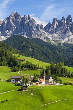 View of Church and mountain backdrop, Val di Funes, Bolzano Province, Trentino-Alto Adige/South Tyrol, Italian Dolomites, Italy, Europe