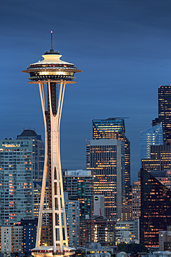 Seattle city skyline at night with illuminated office buildings and Space Needle viewed from public garden near Kerry Park, Seattle, Washington State, United States of America, North America