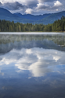 Mist on Lost Lake, Ski Hill and surrounding forest, Whistler, British Columbia, Canada, North America