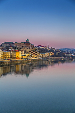 View of Budapest Castle reflecting in the Danube River during early morning, UNESCO World Heritage Site, Budapest, Hungary, Europe