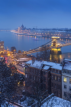 View of Chain Bridge, River Danube and Hungarian Parliament Building from Budapest Castle in winter, UNESCO World Heritage Site, Budapest, Hungary, Europe