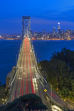 View of San Francisco skyline and Oakland Bay Bridge from Treasure Island at night, San Francisco, California, United States of America, North America