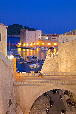 Harbour and Old City Walls at dusk, UNESCO World Heritage Site, Dubrovnik, Dalmatia, Croatia, Europe