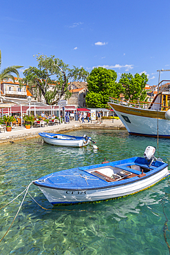 View of harbourside restaurants in Cavtat on the Adriatic Sea, Cavtat, Dubrovnik Riviera, Croatia, Europe