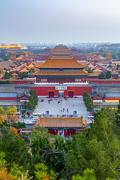 View of the Forbidden City, UNESCO World Heritage Site, from Jingshan Park at sunset, Xicheng, Beijing, People's Republic of China, Asia