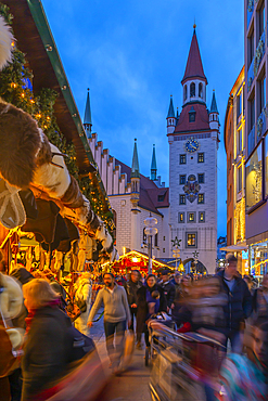 View of Old Town Hall and bustling Christmas Market in Marienplatz at dusk, Munich, Bavaria, Germany, Europe