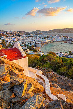 View of chapel and town from elevated view point at sunset, Mykonos Town, Mykonos, Cyclades Islands, Greek Islands, Aegean Sea, Greece, Europe