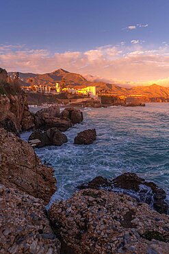 View of Parroquia El Salvador and coastline at sunset in Nerja, Nerja, Malaga Province, Andalucia, Spain, Europe