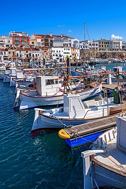 View of boats in marina overlooed by white waashed housses, Ciutadella, Memorca, Balearic Islands, Spain, Europe