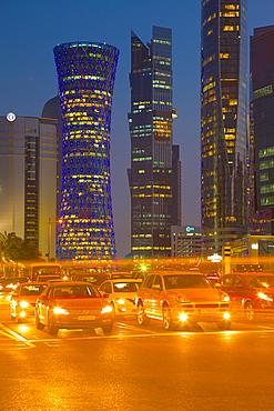 Contemporary architecture and traffic at dusk in the City Centre, Doha, Qatar, Middle East
