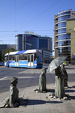 Memorial statues and tram, Old Town, Wroclaw, Silesia, Poland, Europe