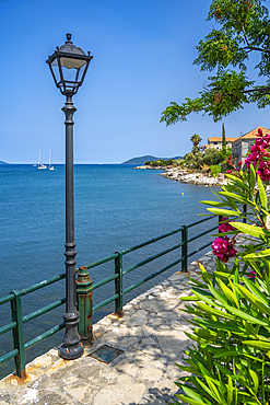 Lamp post on coastal path in Agia Effimia, Kefalonia, Ionian Islands, Greek Islands, Greece, Europe