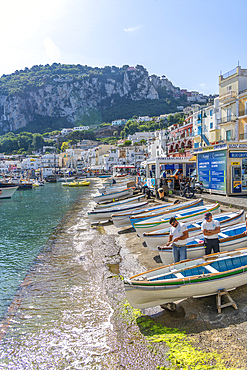 View of boats in Marina Grande overlooked by Capri Town in the background, Isle of Capri, Bay of Naples, Campania, Italy, Mediterranean, Europe