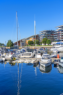 View of boats and architecture at the waterfront, Aker Brygge, Oslo, Norway, Scandinavia, Europe